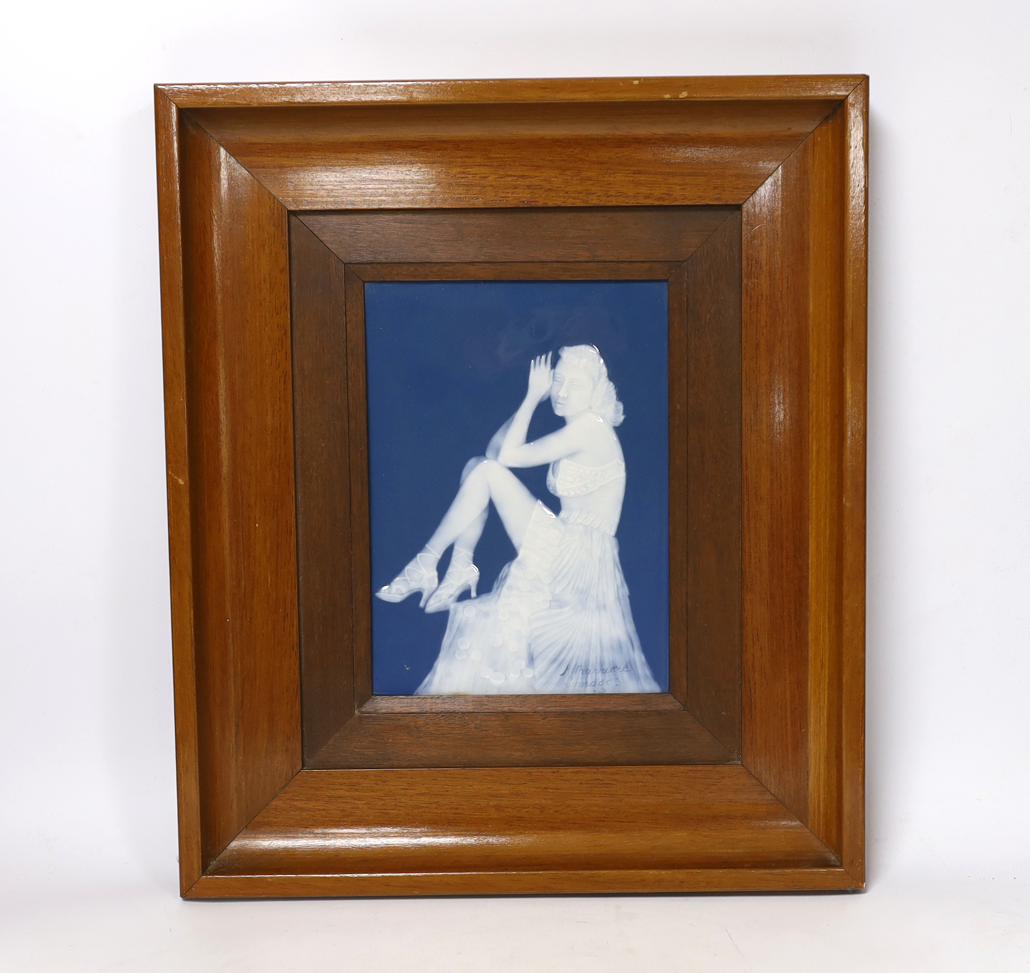 An Art Deco Limoges pate sur pate plaque depicting a seated female, signed, A Barriere, framed, overall 39 x 33cm